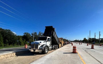 Asphalt separation layer being placed before concrete placement on northbound US 41 just south of SR 52 (8-11-2023 photo)