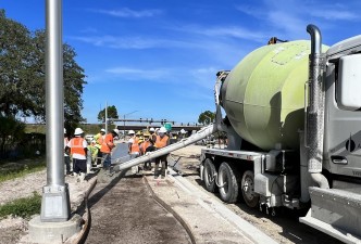 Installing concrete sidewalk just east of the Suncoast Parkway (9-5-2023 photo)