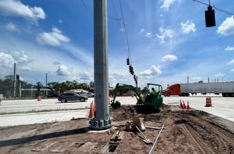 Conduit being installed on the northeast corner of the SR 52 / US 41 intersection (8-1-2023 photo)