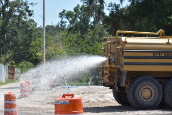 Water is sprayed to control dust in the SR 52 work zone (5-4-2023 photo)