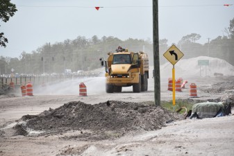 Water is sprayed for dust control in the construction zone on the south side of SR 52 east of Shady Hills Road (4-11-2023 photo)