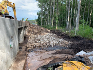 Rubble rip rap is installed for erosion protection at a new box culvert. (June 2020 photo)