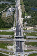 Looking east over SR 52 from the Suncoast Parkway at construction on the south side of the corridor (7-6-2023 photo)