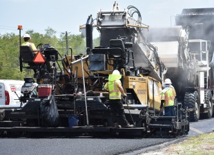 Asphalt paving train working on southbound US 41 near Mossy Timber Blvd. (8-22-2023 photo)