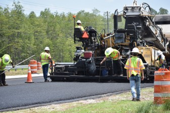 Paving the final asphalt layer (friction course) on southbound US 41 near Mossy Timber Blvd. (8-22-2023 photo)