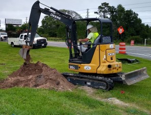 A subcontractor excavating to relocate a gas utility line (6/24/2021 photo)