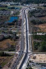 Looking northwest at Asbel Road at construction of northbound US 41 and shared use path  (2/7/2023 photo)