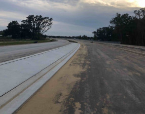 The concrete separator divides the roadway travel directions (December 3, 2020 photo)