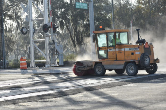 The Sam Allen Road / Buchman Highway intersection intersection is swept on January 16 in preparation for opening it to traffic on January 17