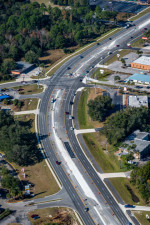 Looking northwest at US 19 (Yulee Drive is at the bend). Widening is nearing completion. (December 8, 2020 photo)