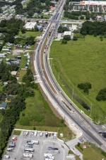 Looking southwest over SR 54 from Lake Crystal Blvd. to the Morris Bridge Rd. / Eiland Blvd. intersection (7-19-2023 photo)