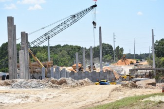 Looking west at retaining wall construction on the west side of I-75 at Overpass Rd. (7/26/2021 photo)