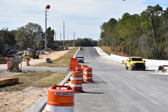 Looking west at Overpass Road construction between I-75 and Old Pasco Road. The paved portion will be for westbound traffic.(1/24/2022 photo)