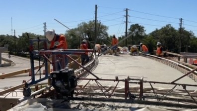 Working on pedestrian bridge deck at the corner of Cortez Blvd. and Cobb Road (4-18-2023 photo)