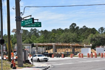 Pedestrian bridge construction on the southwest corner of Cobb Road and Cortex Blvd. (4-19-2023 photo)