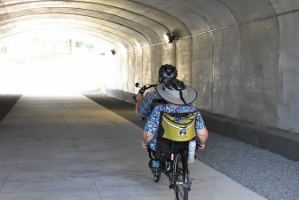 A pair cycling through the US 41 underpass on March 22, 2022.