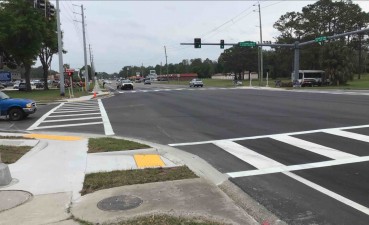 Looking at the northwest corner of SR 44 and Turkey Oak Drive at the newly paved intersection and new pedestrian crossing (3/31/2022 photo)