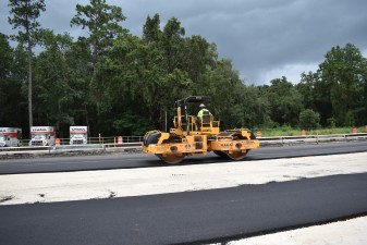 Fresh asphalt is rolled on southbound US 41. Concrete will be placed over this base for the final roadway surface. (8/27/2021 photo)
