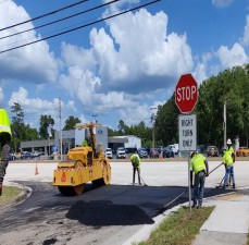 Paving a turnout onto US 41 (May 2022 photo)