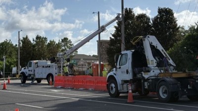 Crews erecting light pole (June 2026 photo)