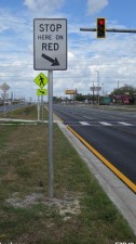 Installed median sign (April 2026 photo)
