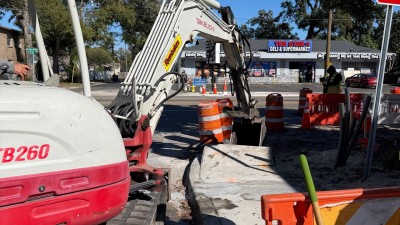 Removing old sections of sidewalk, curb and gutter (January 2026 Photo)