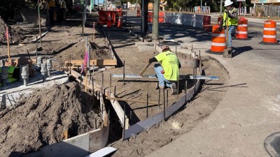 Forming the sidewalk, curb & gutter at the SW corner (February 2026 photo)