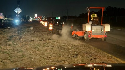 Crews sweep the inside left lane on eastbound SR 580 (April 2026 photo)