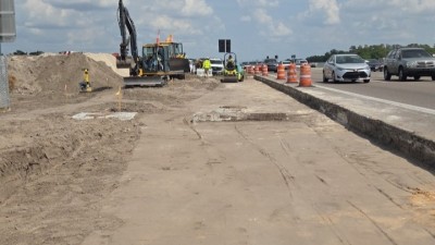 Grade for westbound right turn lane black base (March 2026 photo)