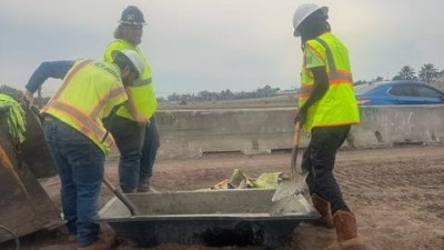 Looking south as crews are mixing bags of concrete for structure inverts (February 2026 photo)
