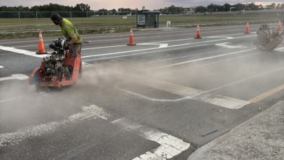 Saw cutting for traffic loops eastbound Hillsborough Avenue (May 2026 photo)
