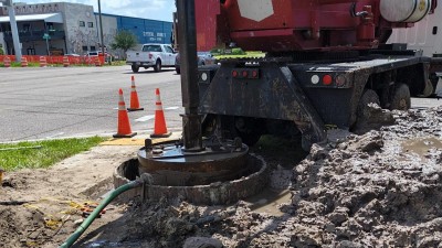 Crews clean out bit to prepare shaft for cage (June 2026 photo)
