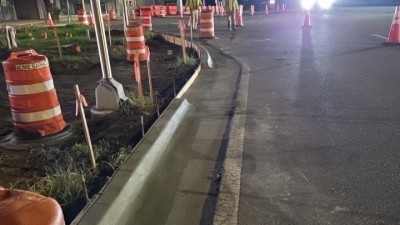 Finished curb at Northwest corner of SR 60 and N 26th (September 2026 photo)