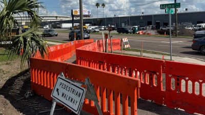 Installed pedestrian detour at the northeast corner (March 2026 photo)