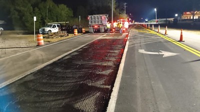 Crews place Tack coat on Lutz Lake Fern Road (January 2026 photo)