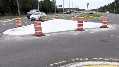 Concrete island ready to mill on SR 54 at Altamont Lane (May 2026 photo)