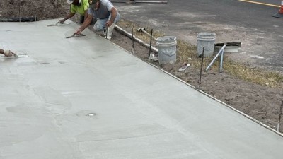 Ditch pavement finishing along SR 54 (May 2026 photo)