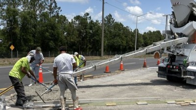 Pouring concrete island on SR 54 at Altamont Lane (May 2026 photo)
