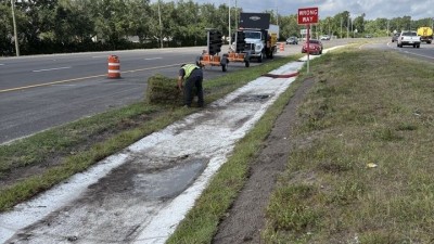 Sodding ditch pavement along SR 54 (May 2026 photo)