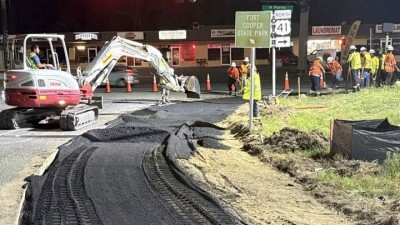 Looking southwest as crews prepare base on widen shoulder (June 2026 photo)