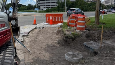 Graded area for sidewalk and curb and gutter at the SE corner (August 2026 photo)