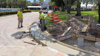 Poured curb and gutter  at the SW corner (August 2026 photo)