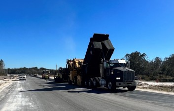 Second lift of asphalt being placed (1/16/2023 photo)