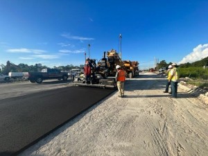 Placing temporary asphalt along US 41 (8/2/2022 photo)