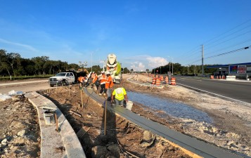 Installing concrete curb just west of the Suncoast Parkway (8-2-2023 photo)