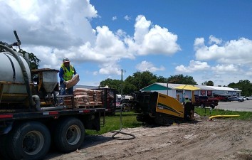 Pipe being installed by directional bore for gas line relocation (7/21/2021 photo)