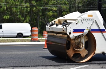 Rolling the final layer of asphalt on southbound US 41 at Mossy Timber Blvd. (8-22-2023 photo)