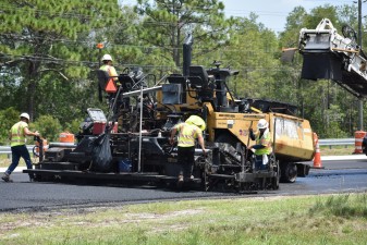 Paving the final asphalt layer (friction course) on southbound US 41 near Mossy Timber Blvd. (8-22-2023 photo)