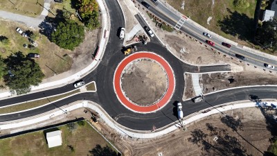 The red concrete placement for the roundabout truck apron is completed (11-13-2025 photo)