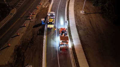 Crews work just past midnight to prepare the roundabout for opening (11-19-2025 photo)